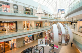 Vilnius, Lithuania - January 28, 2019: Modern shopping center Europa interior with luxury brand shops, no people in Vilnius, Lithuania